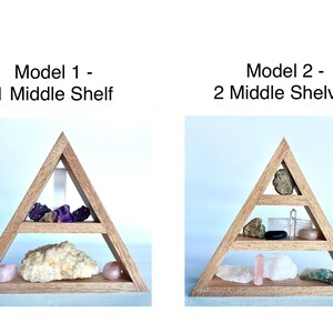 May include: Two wooden triangular shelves, one with one middle shelf and the other with two middle shelves. Both shelves are decorated with various crystals and stones.