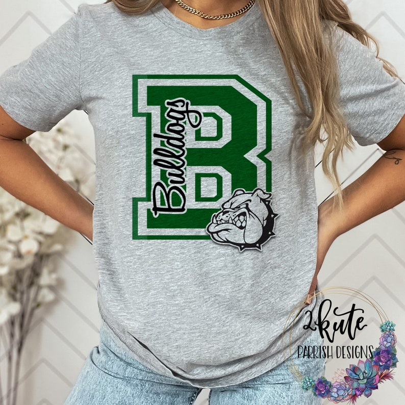 May include: A gray t-shirt with a green letter "B" and the word "Bulldogs" printed on it. A bulldog head is below the letter.
