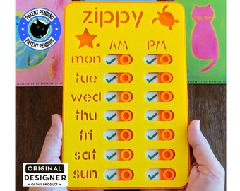 May include: A yellow plastic daily planner with the word "zippy" printed on it. The planner has a star, checkmarks, and circles for each day of the week. The days of the week are labeled "mon", "tue", "wed", "thu", "fri", "sat", and "sun".