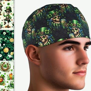 May include: A black and green skull cap featuring a repeating pattern of a skull wearing a green hat and scarf, holding a drink. The skull cap has a diamond pattern and shamrocks.