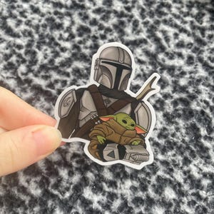 Naklejka winylowa Mando i Grogu