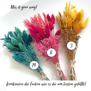 May include: Bundles of dried flowers in teal, pink, and yellow, tied with twine. The image includes the text "Mix it your way!" and numbers 3, 8, and 14 in white circles. The flowers are arranged against a white background.