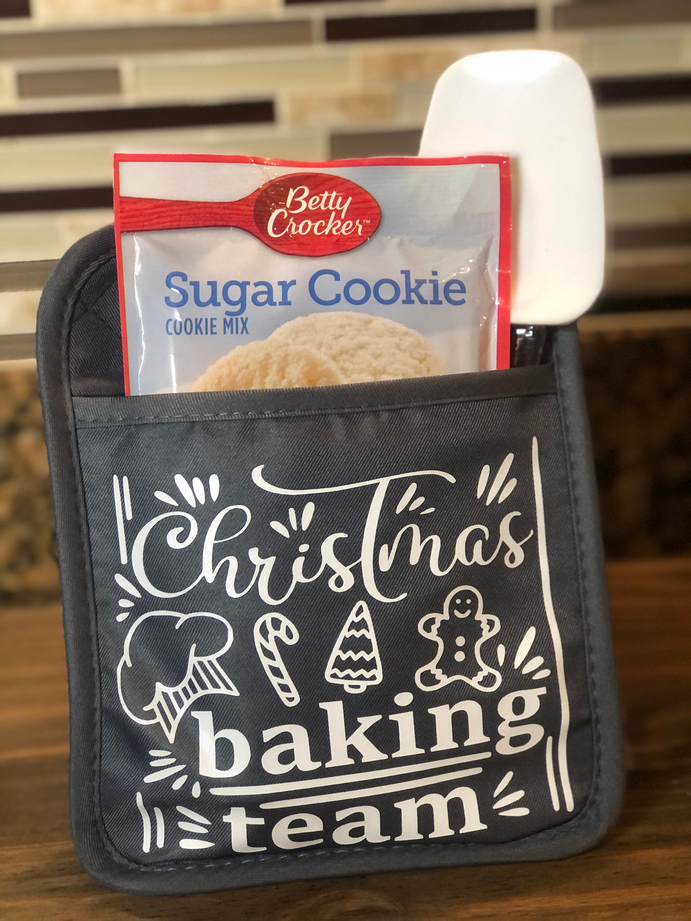 Christmas Custom pot holders with baking mix and spatula. Over Etsy