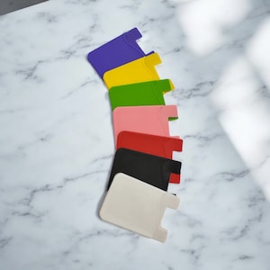 Tarjetero de silicona - Accesorios para teléfonos móviles - Compre uno y llévese otro gratis - Varios colores