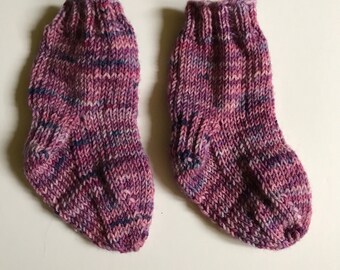 Hand-knit baby socks made with 100% wool