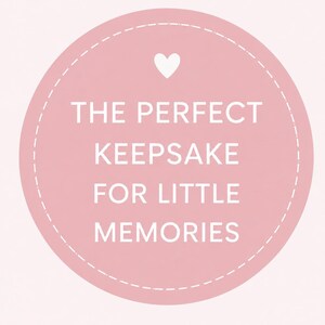 May include: A circular light pink graphic featuring a white dashed border and a small white heart icon at the top. The text in white capital letters reads: THE PERFECT KEEPSAKE FOR LITTLE MEMORIES. The design is centered on a solid light pink background.