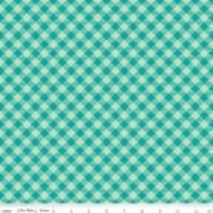 Könnte beinhalten: Ein türkisfarbener und grüner Gingham-Stoff mit einem karierten Muster.