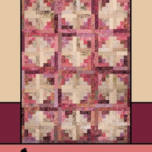 May include: A quilt pattern called "Quartz" by Melissa Milligan for Villa Rosa Designs. The quilt is made up of squares of different shades of pink, purple, and brown fabric.