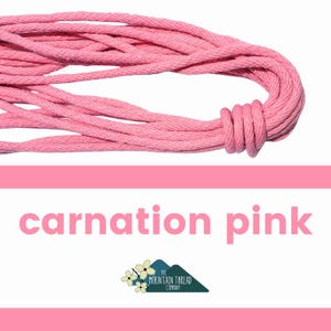May include: Carnation pink cotton rope, tightly wound and looped, against a white background. The text "carnation pink" is displayed in a bold, sans-serif font. The Mountain Thread Company logo is at the bottom.