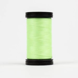 May include: A spool of light green thread with black plastic caps at either end.