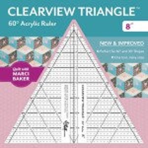 May include: Clearview Triangle 60" Acrylic Ruler, 8" in size, with a pink background and the text "Clearview Triangle 60" Acrylic Ruler 8" View & Reflect 60" Ruler & 60"  Triangle" printed on it.