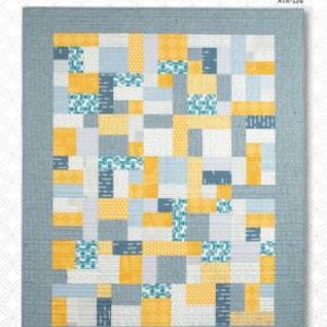 May include: A quilt pattern called "Yellow Brick Road" by Atkinson Designs. The pattern features a patchwork design with yellow, blue, and white squares.