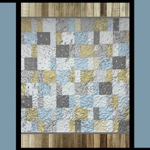May include: A quilt pattern called "Mod Tiles Too" by Tricia Lynn Maloney for Orphan Quilt Designs and Villa Rosa Designs. The quilt is made up of squares in shades of blue, gray, and yellow.