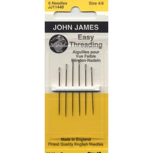May include: A pack of 6 John James Easy Threading needles, size 4/8, made in England. The needles are packaged in a yellow and white card with the brand name and product description printed on it.