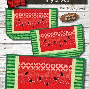 May include: Three watermelon-themed placemats, each measuring 11 inches by 18 inches. The placemats are made of fabric and feature a green watermelon rind with red watermelon flesh and black seeds. The placemats are labeled "Watermelon Place" and "Quilt-as-ya-Go".