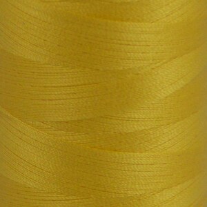 May include: A spool of bright yellow thread.
