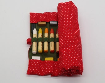 Roll case, pen roll, wax crayons, pad, red dots, rubber band