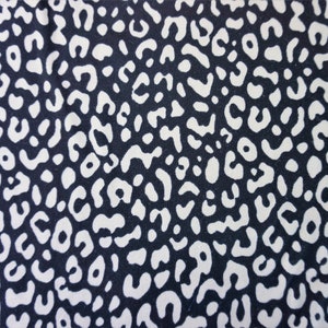 Double Brushed Poly Knit Fabric Black Tan Leopard Print | 62 inch width | DBP; Poly Spandex Blend | Sold by Half Yard or 1 Yard