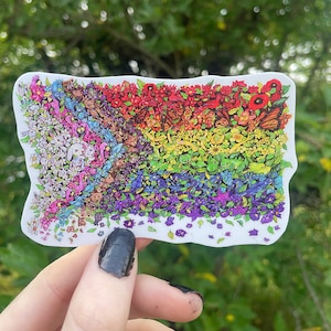 May include: A rainbow pride flag sticker with a floral design. The sticker features a variety of flowers, butterflies, and other insects in a rainbow pattern.