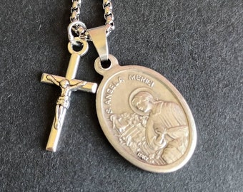 St Angela Merici. Stainless steel box chain with saint medal and crucifix.