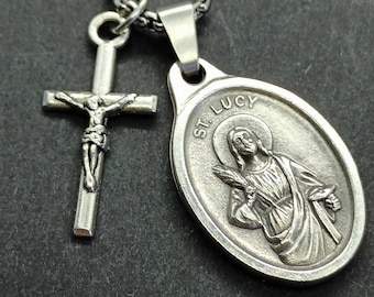 St Lucy necklace. Stainless steel box chain with saint medal and crucifix.