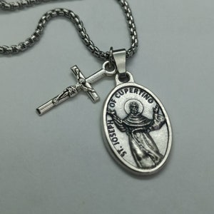 St Joseph of Cupertino necklace. Stainless steel chain with crucifix and silver oxide medal.