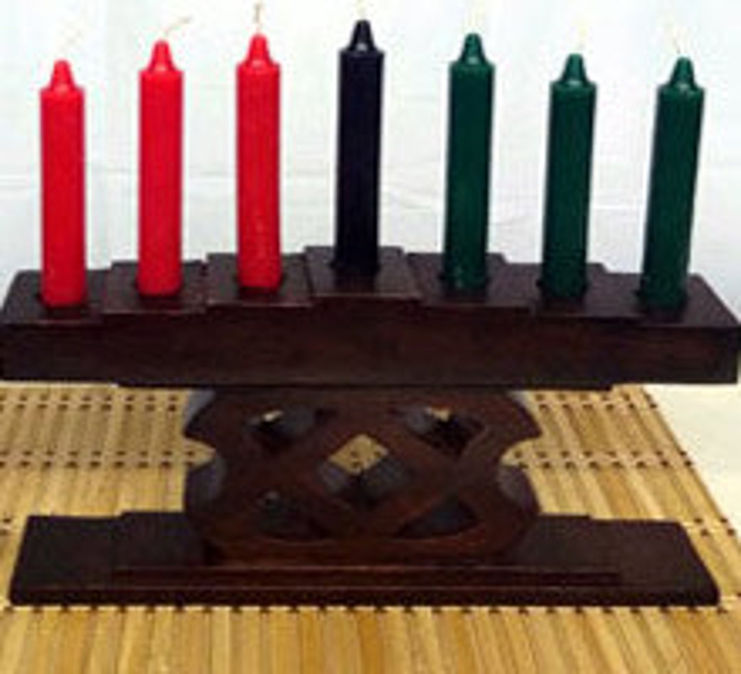 1. Kwanzaa Kinara Candle Holder Road to Success Etsy