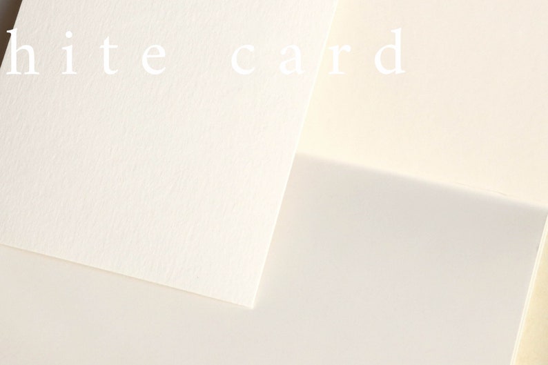 May include: Three pieces of white card stock, arranged in an overlapping pattern. The top piece has the text "white card" printed on it.