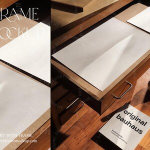 May include: A wooden drawer with two white pieces of paper inside. The drawer is open and the paper is visible. The drawer is on a wooden surface with a book titled "original bauhaus" and a ceramic vase.