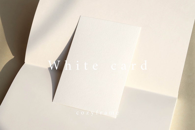 May include: A blank white card on a white background. The text "White card" is printed on the background.