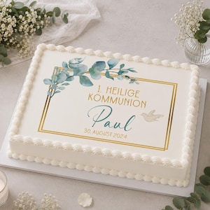 Può includere: Una torta bianca rettangolare con un bordo decorativo. La torta presenta un design con cornice dorata con accenti floreali blu-verdi, il nome "Paul" e la data "30. August 2024". È inclusa anche una piccola grafica di colomba.