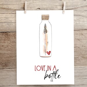 May include: A watercolour illustration of a glass bottle with a cork stopper. Inside the bottle is a single stalk of wheat and a small red heart. The text "LOVE IN A BOTTLE" is written below the bottle.