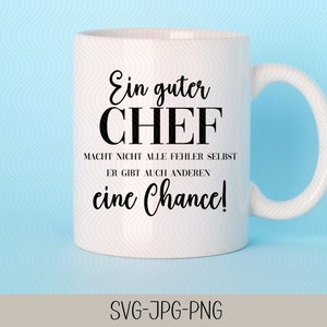 May include: White ceramic mug with black text that reads "Ein guter CHEF macht nicht alle Fehler selbst er gibt auch anderen eine Chance!"