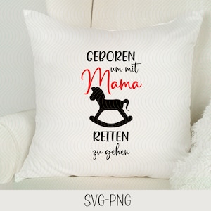 May include: White pillow with black text that reads "Geboren um mit Mama Reiten zu gehen" and a black silhouette of a rocking horse.