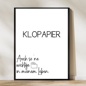 Op de afbeelding: Zwart-witte printbare wandkunst met de tekst "KLOPAPIER" en "Auch so 'ne wichtige in meinem Leben".