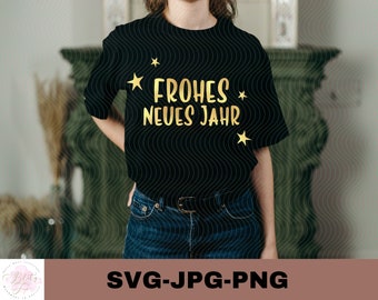 Op de afbeelding: Een zwart T-shirt met gouden tekst die "Frohes Neues Jahr" en gouden sterren zegt.