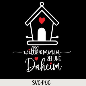 May include: White silhouette of a birdhouse with a red heart on the roof and the text "Willkommen bei uns Daheim" in white with red hearts.