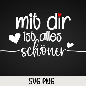 May include: White text on a black background reads "mit dir ist alles schöner" with hearts surrounding the text. The text translates to "with you everything is more beautiful".