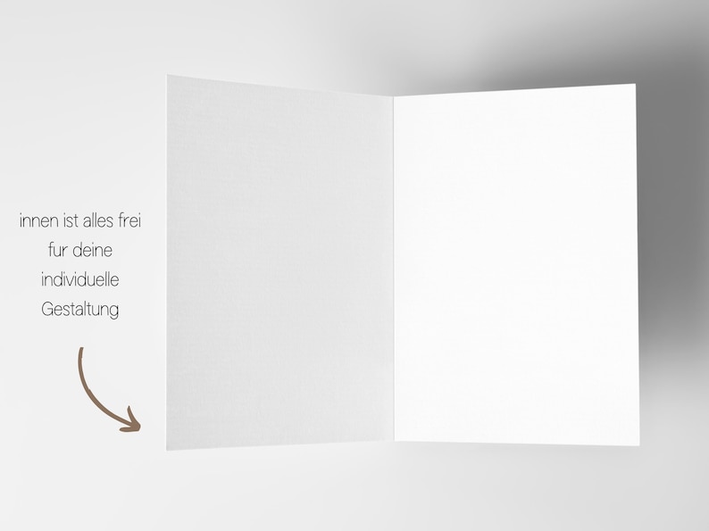 May include: A blank white card with a folded edge. The inside of the card is blank and the outside has the text "innen ist alles frei fur deine individuelle Gestaltung".