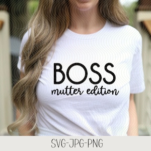Peut inclure: Un t-shirt blanc avec le texte "BOSS mutter edition" en lettres noires.