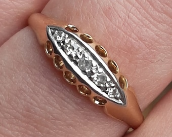 An 18ct gold Edwardian diamond five stone boat-head ring