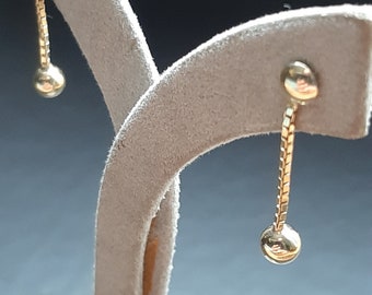 A 9ct gold pair of chain link and gold ball drop earrings