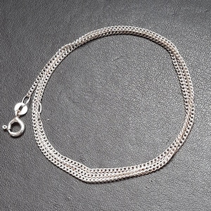 A vintage 18 inch solid silver curb link chain