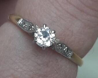 A vintage 18ct gold and platinum diamond ring