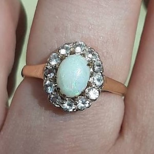 A vintage 9ct gold opal and spinel ring