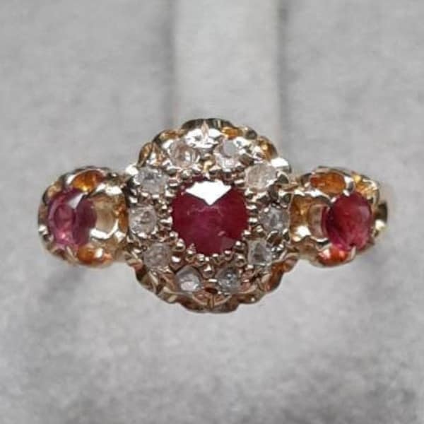 An antique 18ct gold and platinum ruby and diamond ring