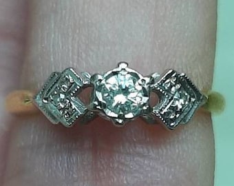 A vintage 18ct gold diamond ring