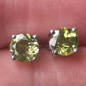 A vintage pair of silver peridot stud earrings