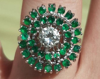 A vintage 18ct white gold emerald and diamond ring