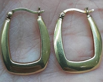 A vintage pair of 9ct gold hoop earrings